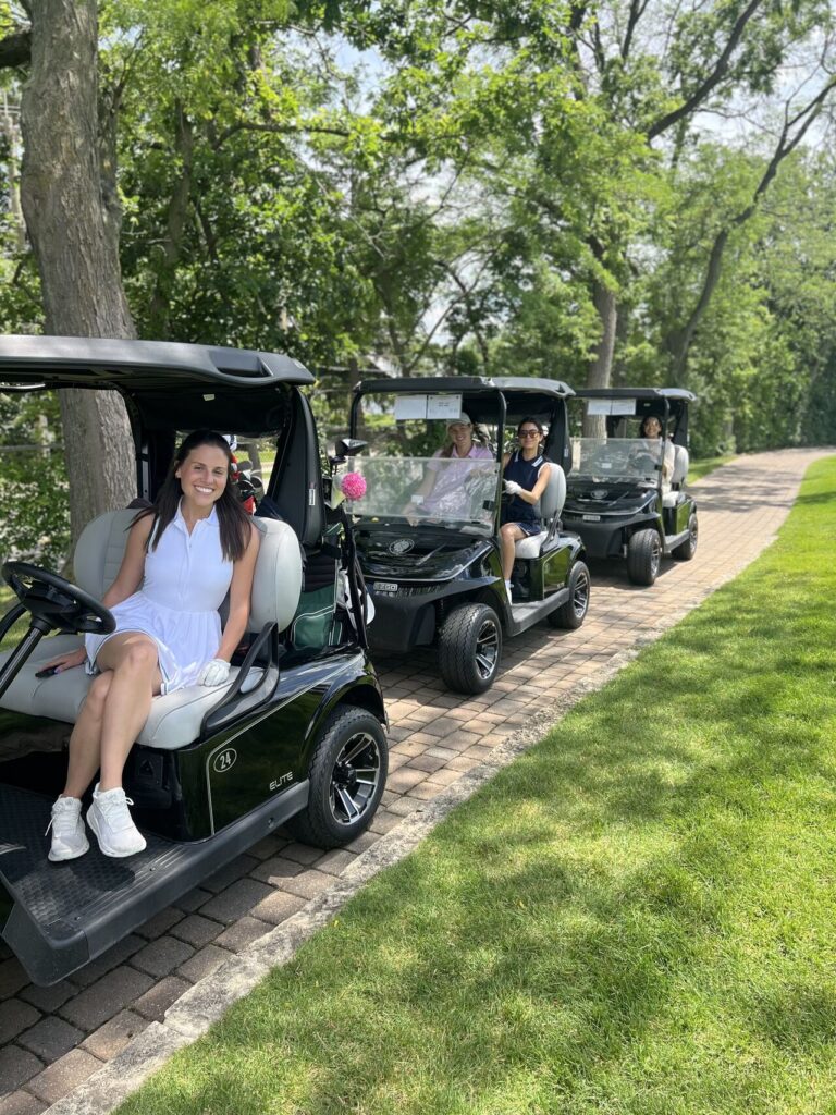 Team in golf carts